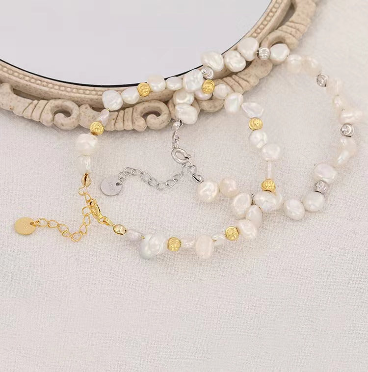 Pulsera de plata maciza S925 con auténtica perla barroca.