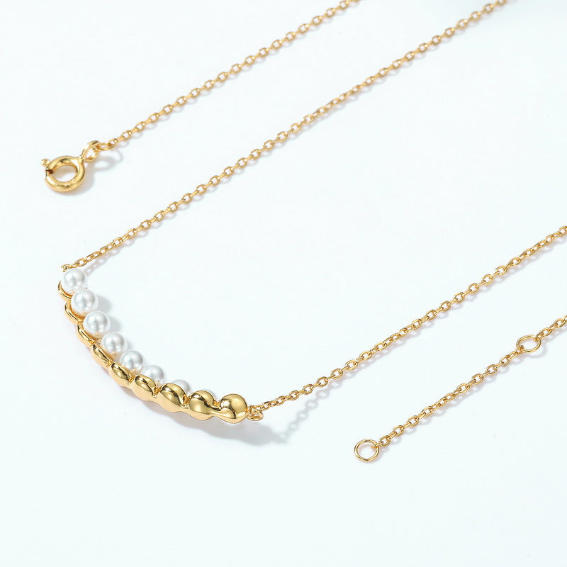Collar con puente de luna de concha y perla hecho a mano