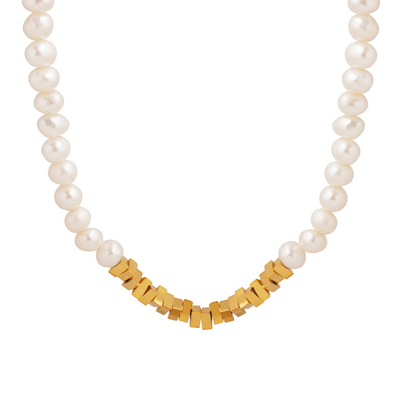 Collar moderno para dama de acero y titanio con auténtica perla de agua dulce