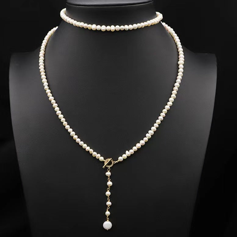 Collar Éblouissant de cola de elfo con perlas de agua dulce genuinas