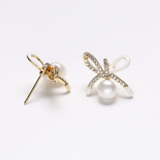 Pendientes de lazo de la suerte de plata maciza S925 con auténtica perla de agua dulce