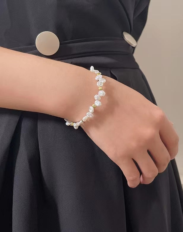Pulsera de plata maciza S925 con auténtica perla barroca.