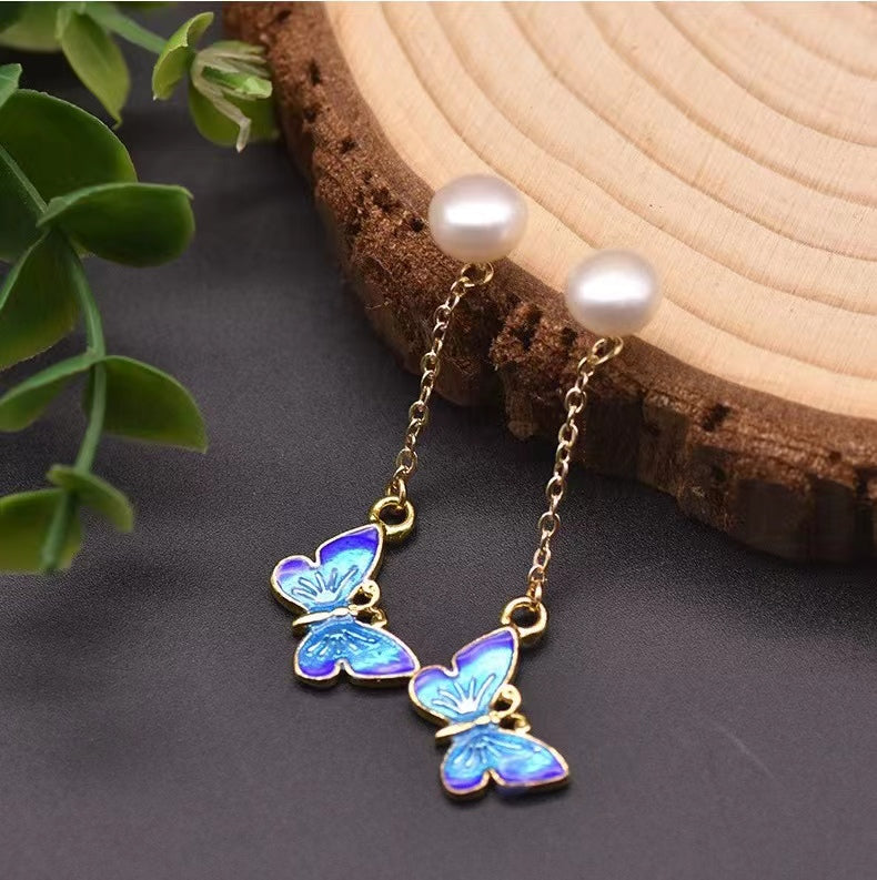 Boucles d'oreilles papillon bleues en perles baroques d'eau douce véritables (édition limitée)