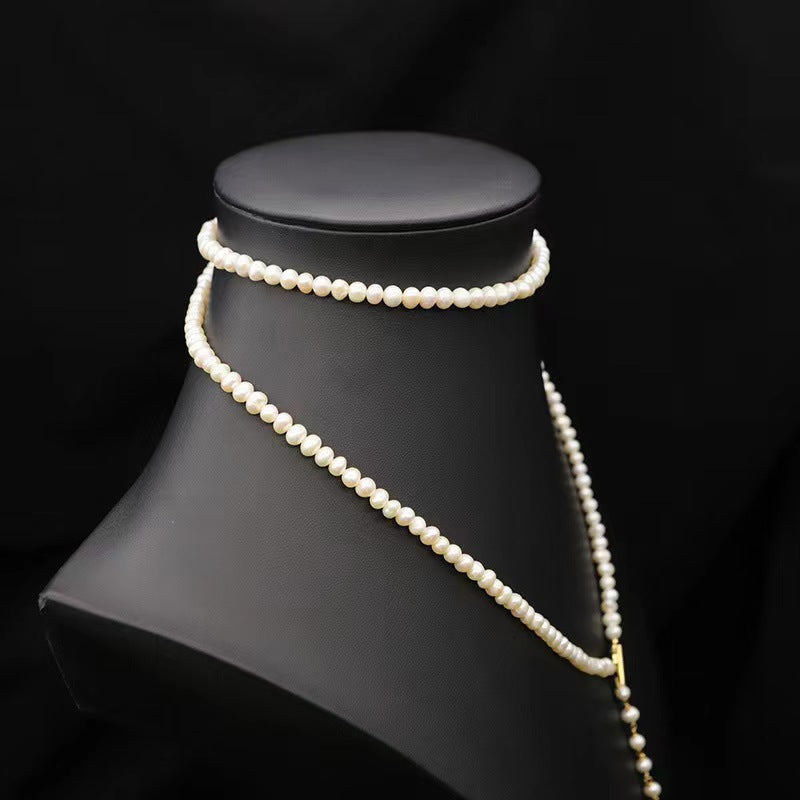Collar Éblouissant de cola de elfo con perlas de agua dulce genuinas