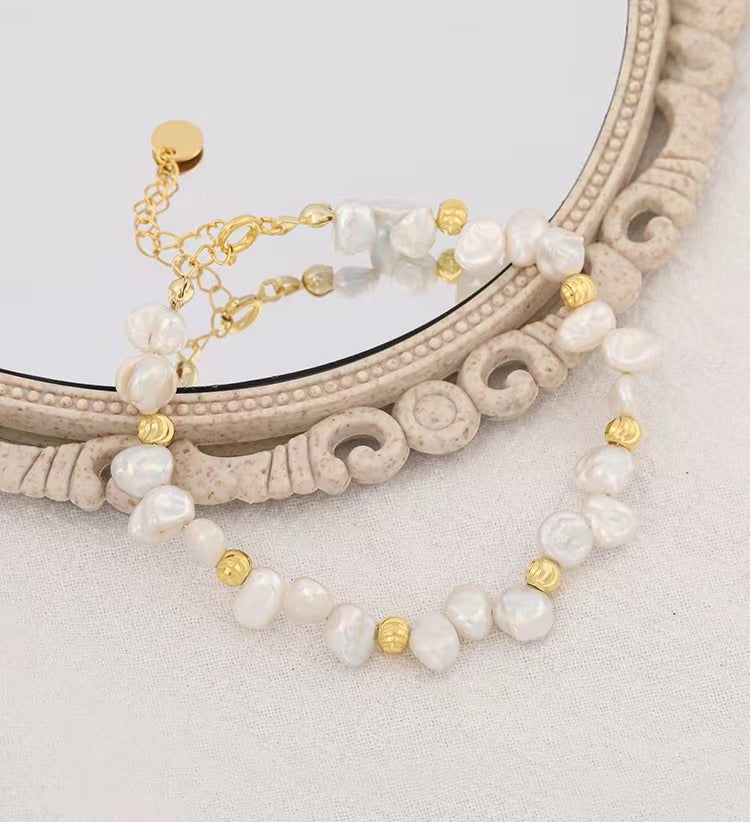 Pulsera de plata maciza S925 con auténtica perla barroca.