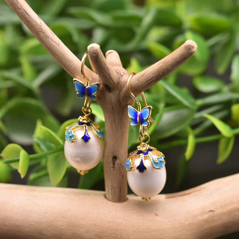 Pendientes de mariposa azul con auténtica perla barroca de agua dulce (edición limitada)
