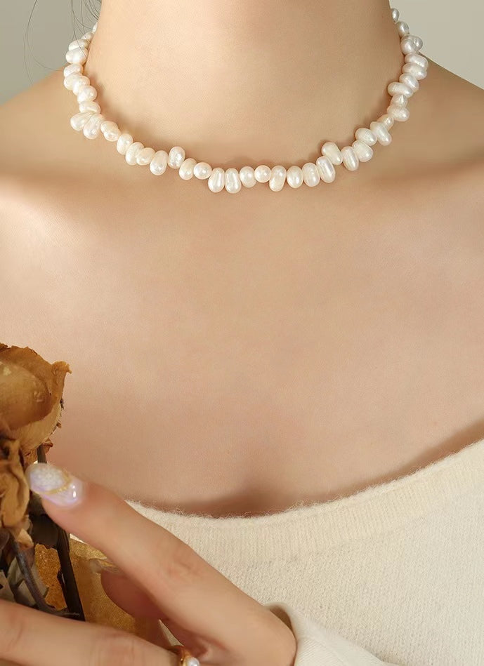 Collar de arroz de acero y titanio con perla de agua dulce genuina