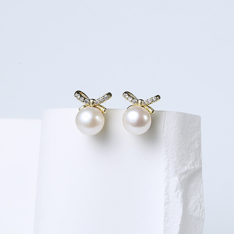 Boucles d'oreilles nœud papillon en perles d'eau douce véritables