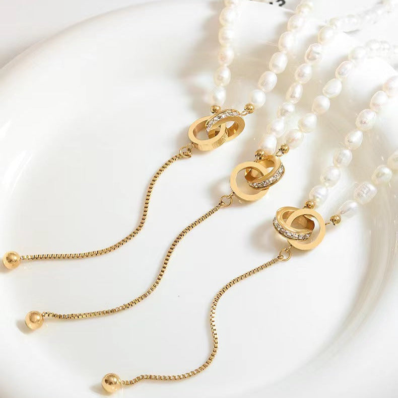 Collier Cercle d'espoir en acier titane et perles d'eau douce véritables
