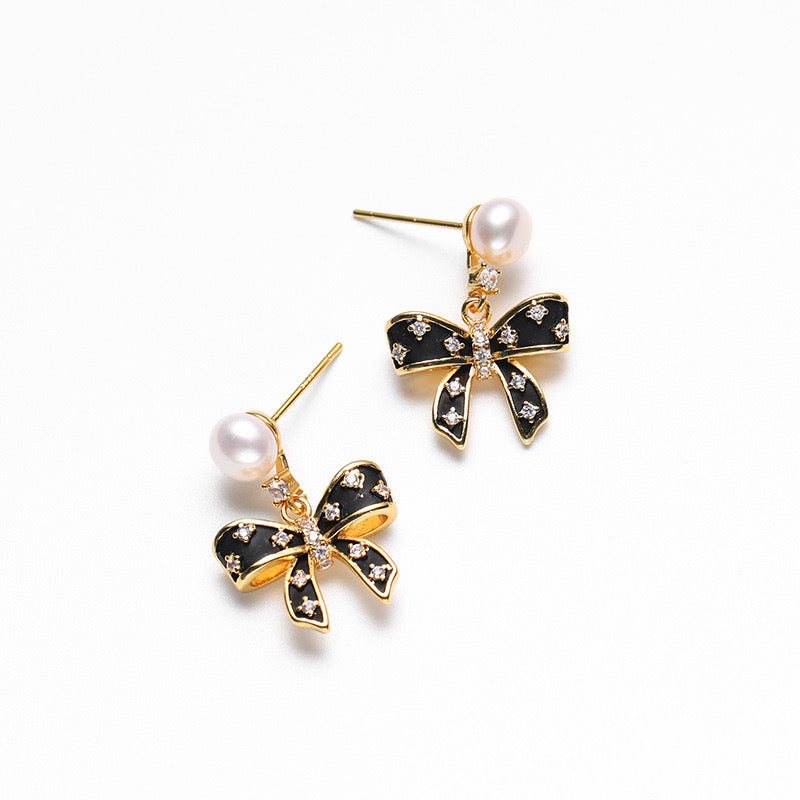 Boucles d'oreilles nœud papillon en perles d'eau douce véritables
