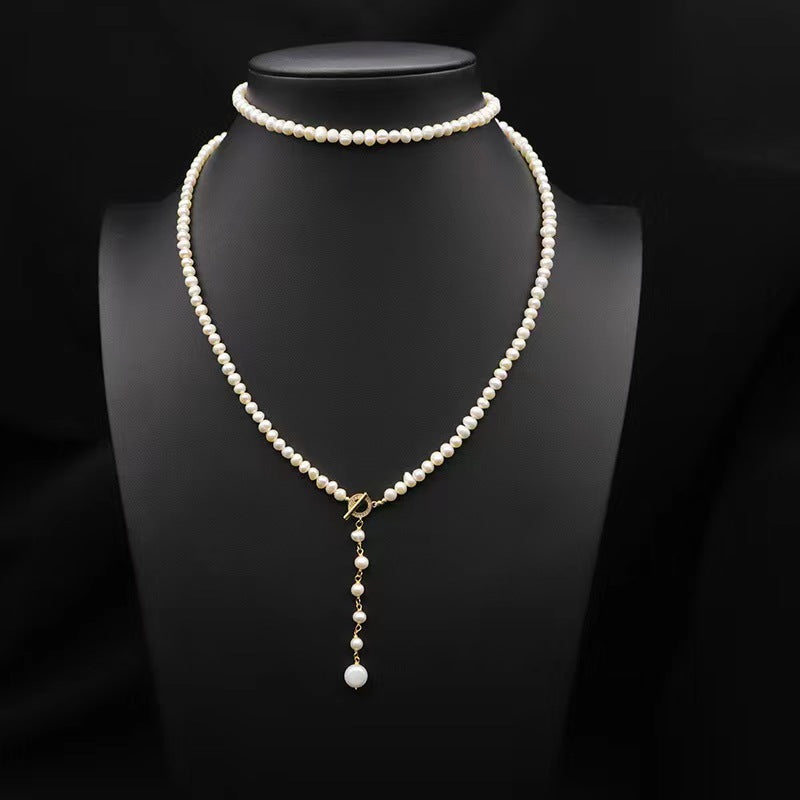 Collar Éblouissant de cola de elfo con perlas de agua dulce genuinas