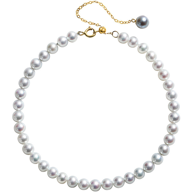 Bracelet en or massif 18 carats et véritable perle d'eau douce au mercure