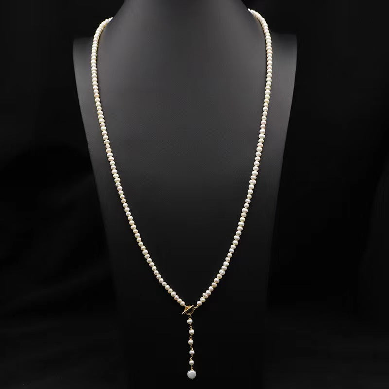 Collar Éblouissant de cola de elfo con perlas de agua dulce genuinas