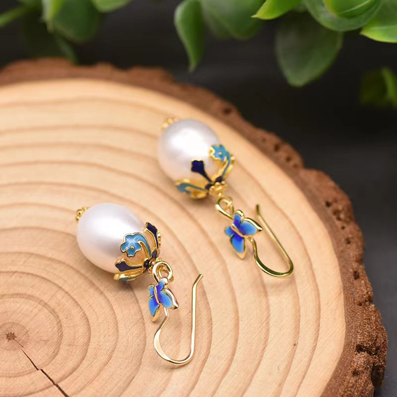 Pendientes de mariposa azul con auténtica perla barroca de agua dulce (edición limitada)