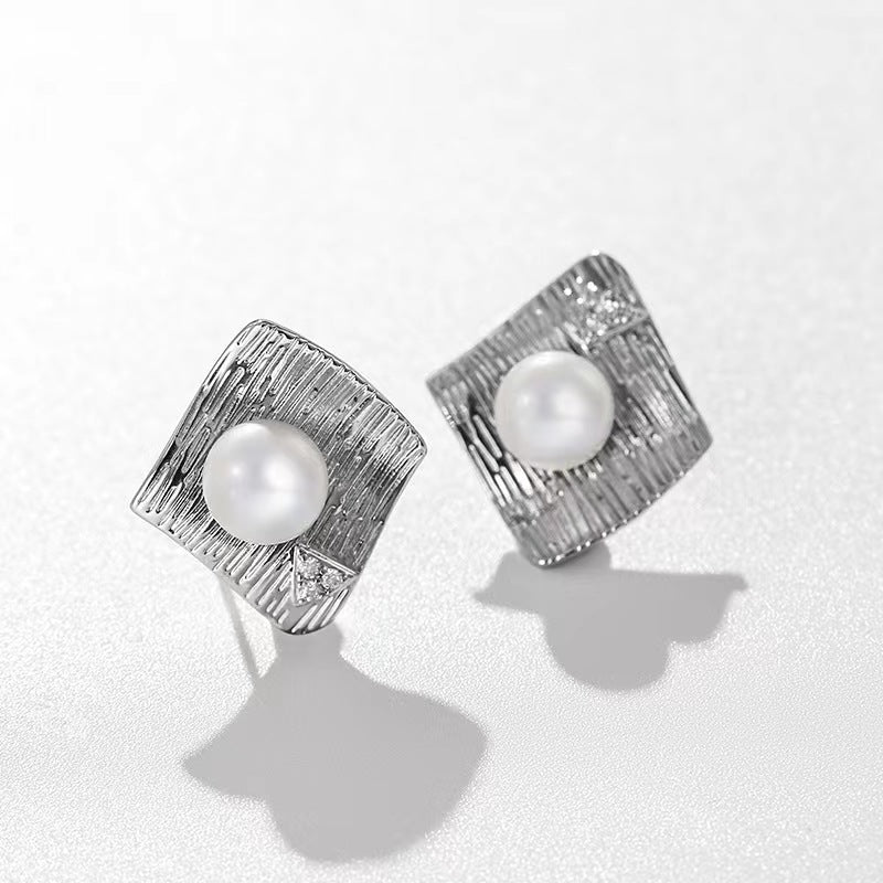 Pendientes de perlas de agua dulce genuinas con ondas de agua