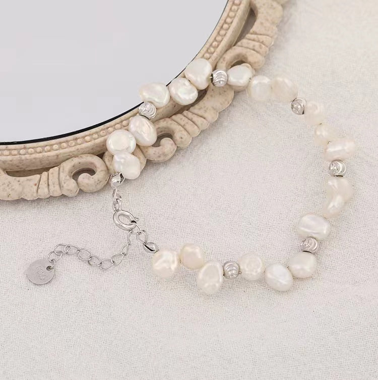Pulsera de plata maciza S925 con auténtica perla barroca.