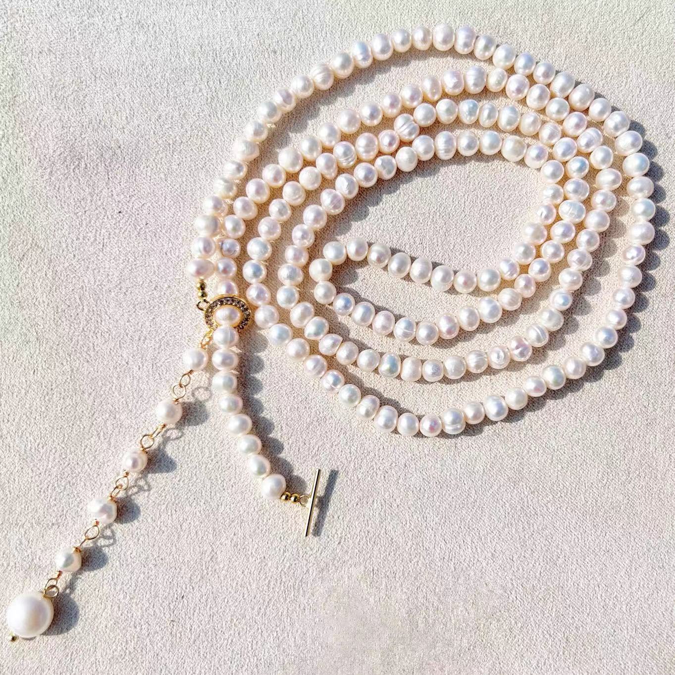 Collar Éblouissant de cola de elfo con perlas de agua dulce genuinas