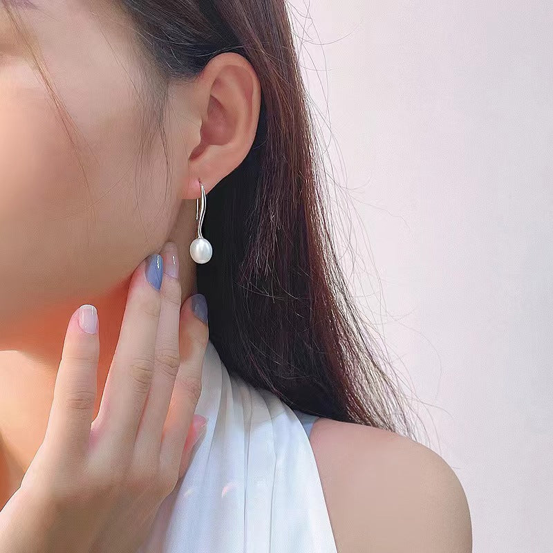 Boucles d'oreilles œil de mer en argent massif S925 avec véritable perle d'eau douce