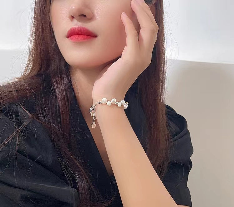 Pulsera de plata maciza S925 con auténtica perla barroca.