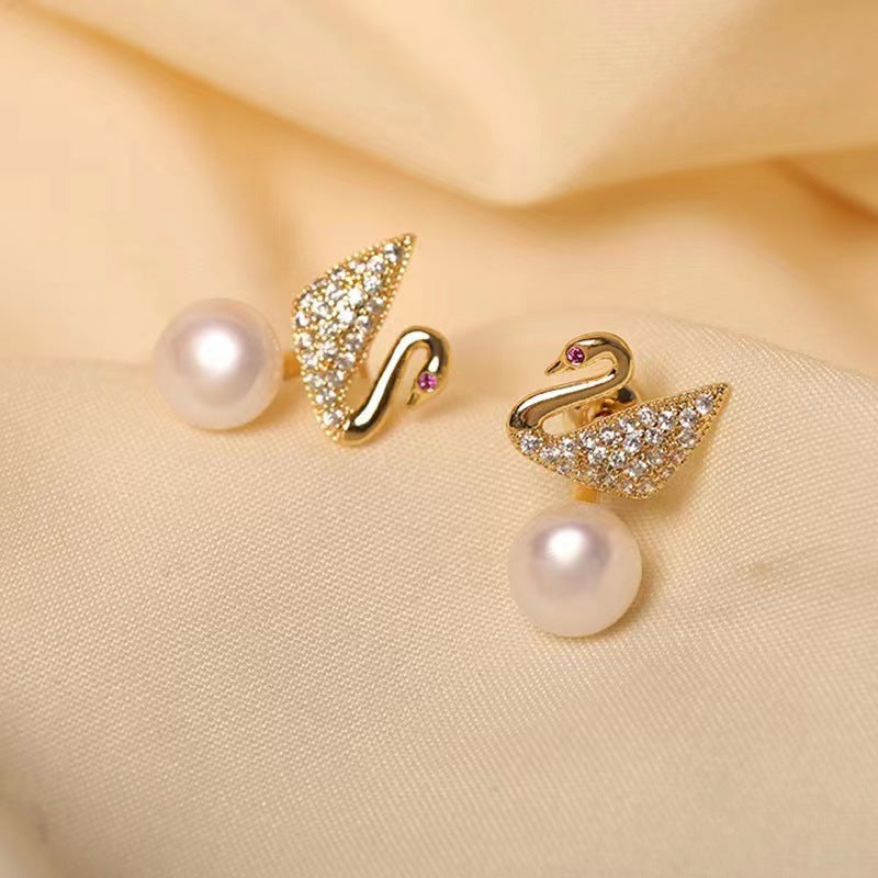 Boucles d'oreilles cygne en perles d'eau douce véritables