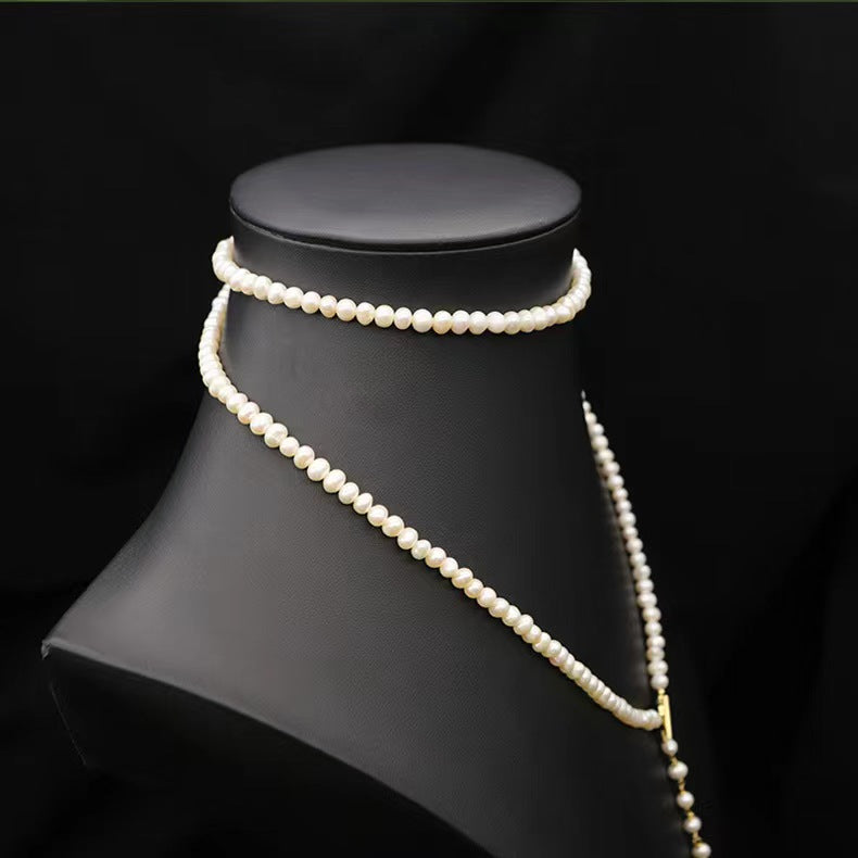 Collar Éblouissant de cola de elfo con perlas de agua dulce genuinas