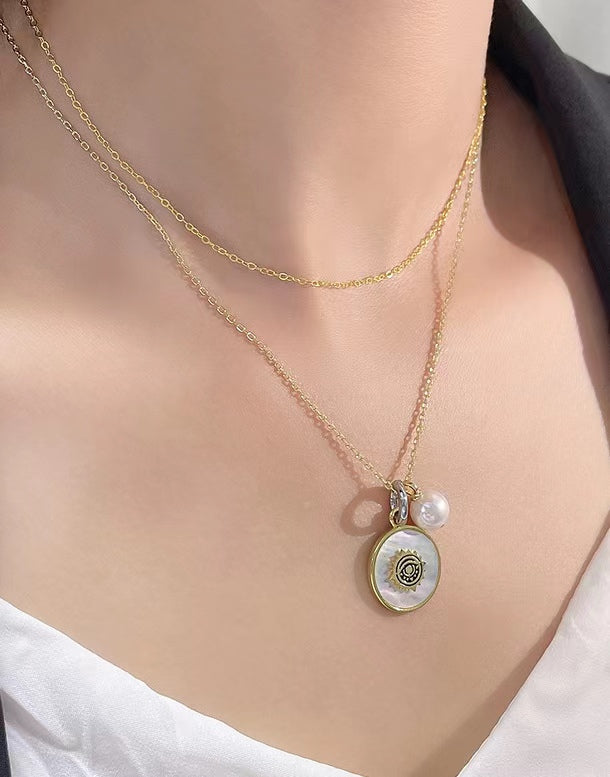 Collier en argent massif S925 avec véritable perle d'eau douce et œil de chance