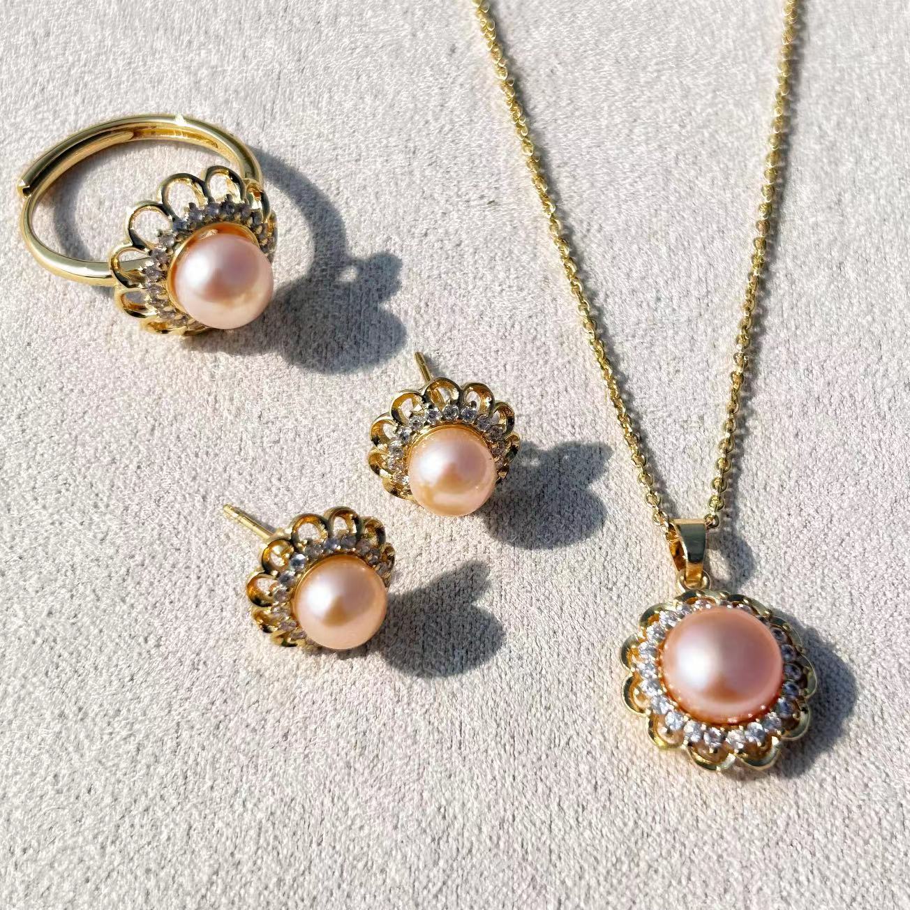 Conjunto de perlas barrocas de agua dulce genuinas con puesta de sol en el océano