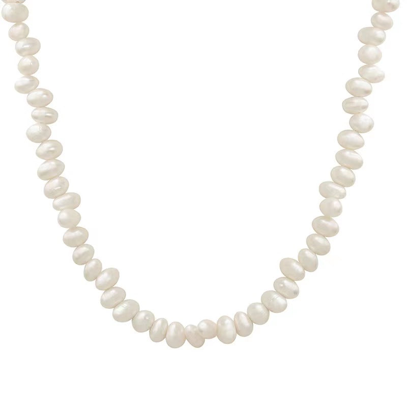 Collar de arroz de acero y titanio con perla de agua dulce genuina