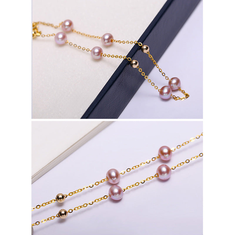 Bracelet en or massif 18 carats avec véritable perle d'eau douce violette et gypsophile