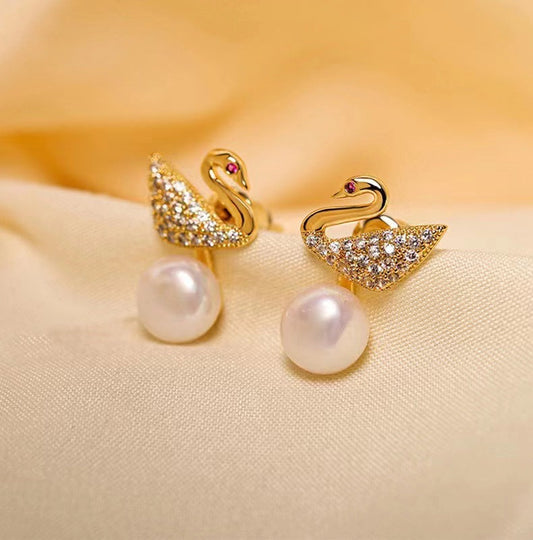Boucles d'oreilles cygne en perles d'eau douce véritables