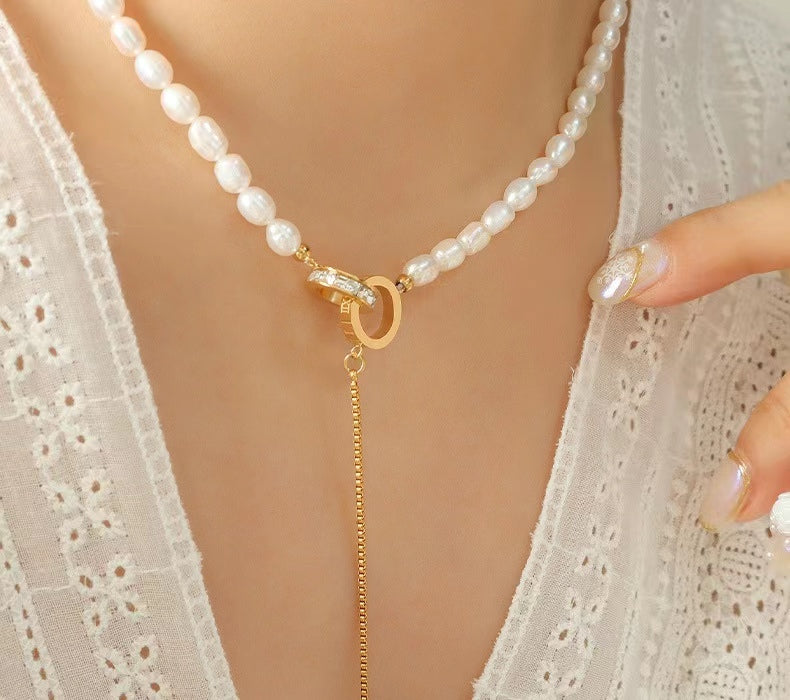 Collar de acero y titanio con forma de círculo de la esperanza y perla de agua dulce auténtica