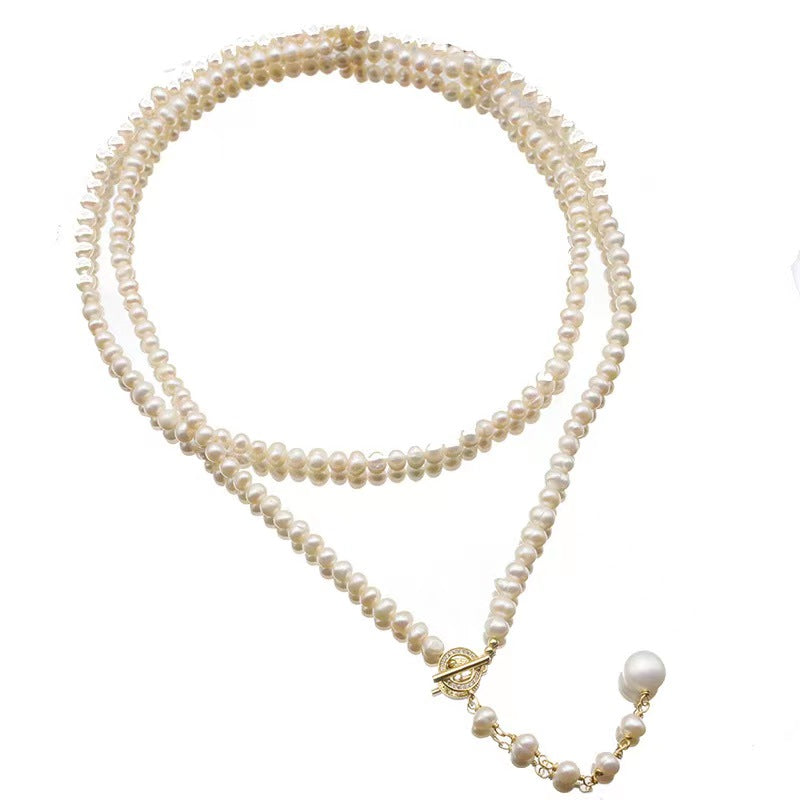 Collar Éblouissant de cola de elfo con perlas de agua dulce genuinas