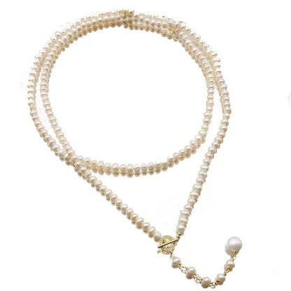 Collar Éblouissant de cola de elfo con perlas de agua dulce genuinas