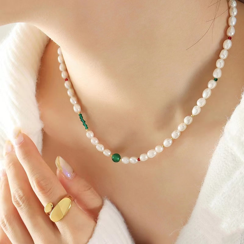 Collar de ojo verde de acero y titanio con perla de agua dulce genuina