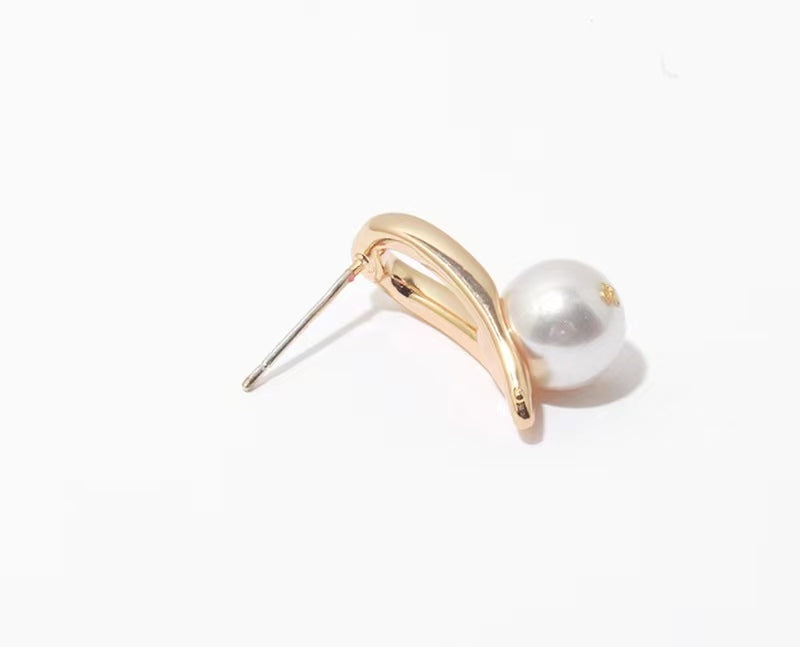 Boucles d'oreilles style fer à cheval en perles baroques d'eau douce véritables