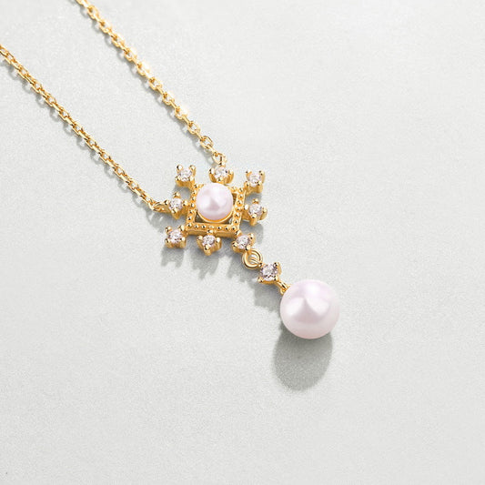Collier flocon de neige sacré en véritable perle d'eau douce naturelle
