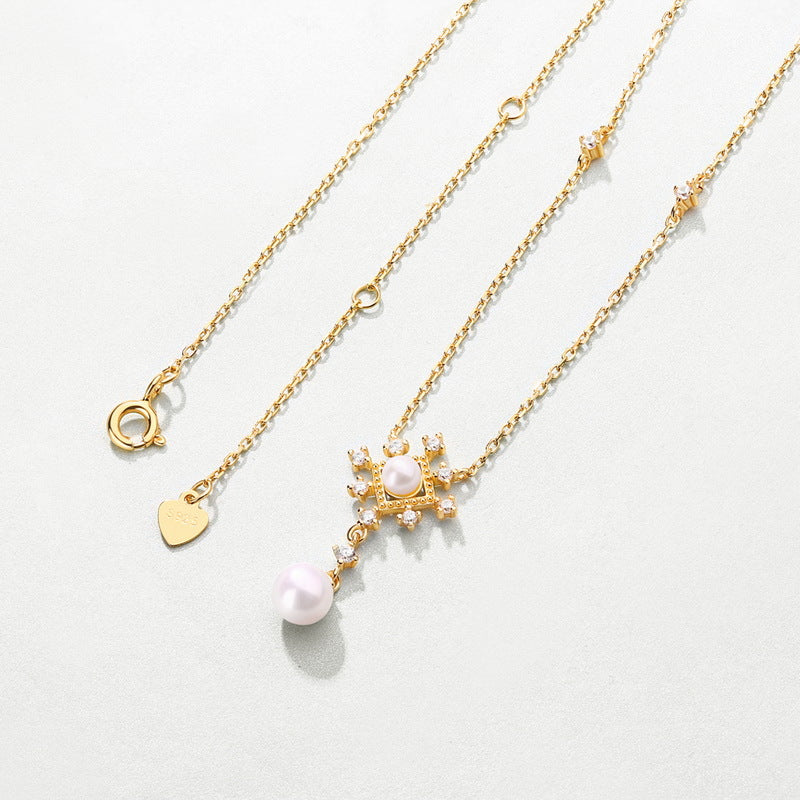 Collier flocon de neige sacré en véritable perle d'eau douce naturelle