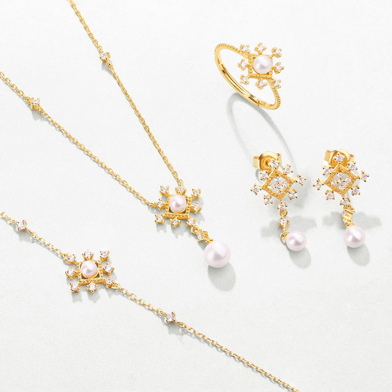 Collier flocon de neige sacré en véritable perle d'eau douce naturelle