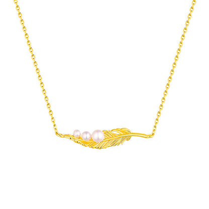 Collar de plumas doradas con perlas de agua dulce naturales genuinas