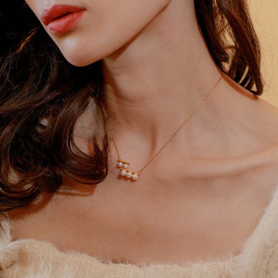 Collar de órgano sagrado de concha y perla hecho a mano