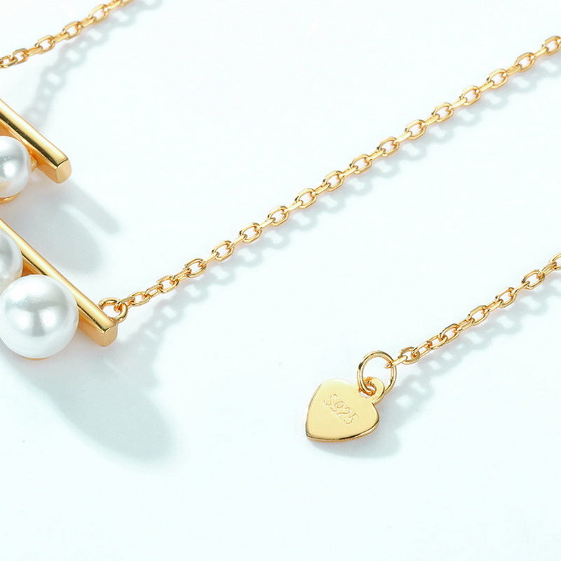 Collar de órgano sagrado de concha y perla hecho a mano