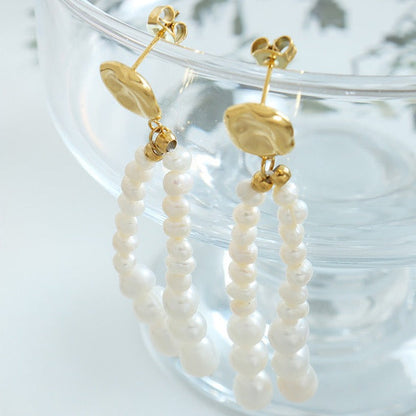 Pendientes Morning Dew de acero y titanio con auténtica perla de agua dulce