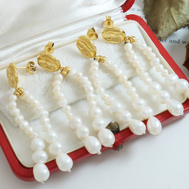 Pendientes Morning Dew de acero y titanio con auténtica perla de agua dulce