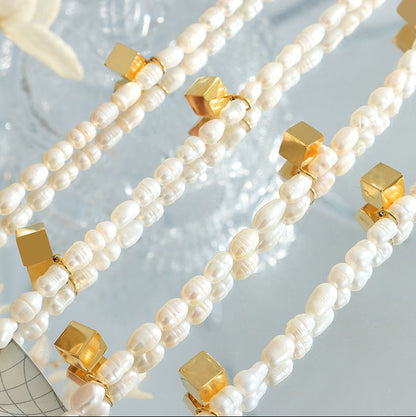 Collar de cubo mágico de acero y titanio con perla de agua dulce genuina