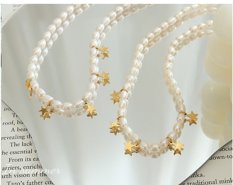 Collar de estrellas de acero y titanio con perlas de agua dulce auténticas