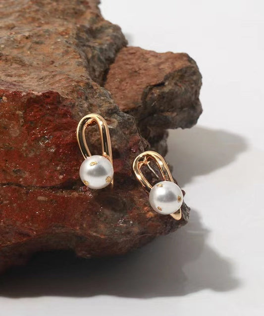Boucles d'oreilles style fer à cheval en perles baroques d'eau douce véritables