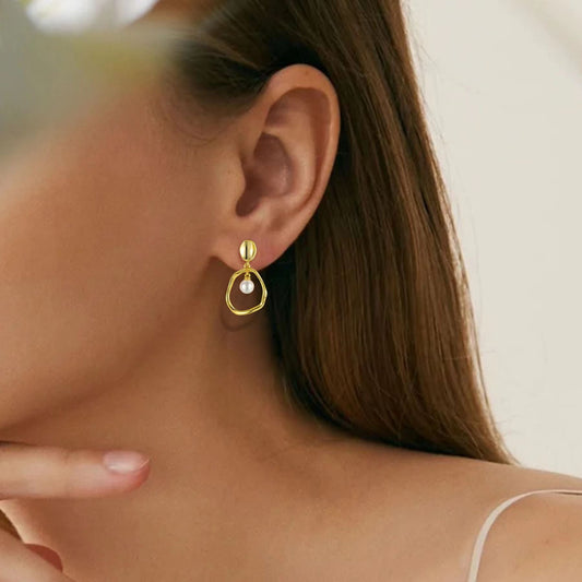 Boucles d'oreilles en or avec perles d'eau douce véritables