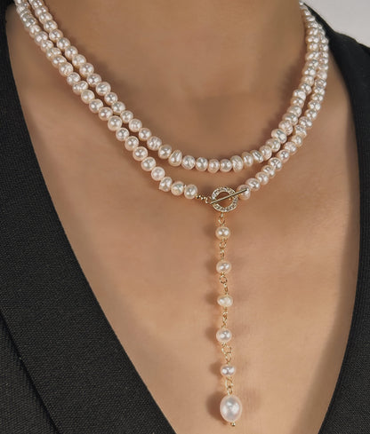 Collar Éblouissant de cola de elfo con perlas de agua dulce genuinas