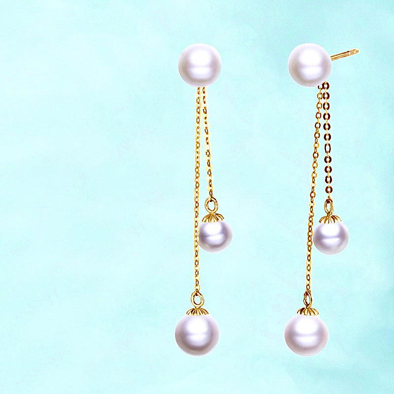 Pendientes de oro macizo de 18 quilates con tres gotas de agua de perla de agua dulce genuina