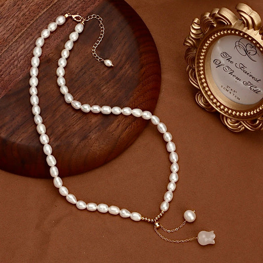 Collar de jade rosa con auténtica perla barroca de agua dulce